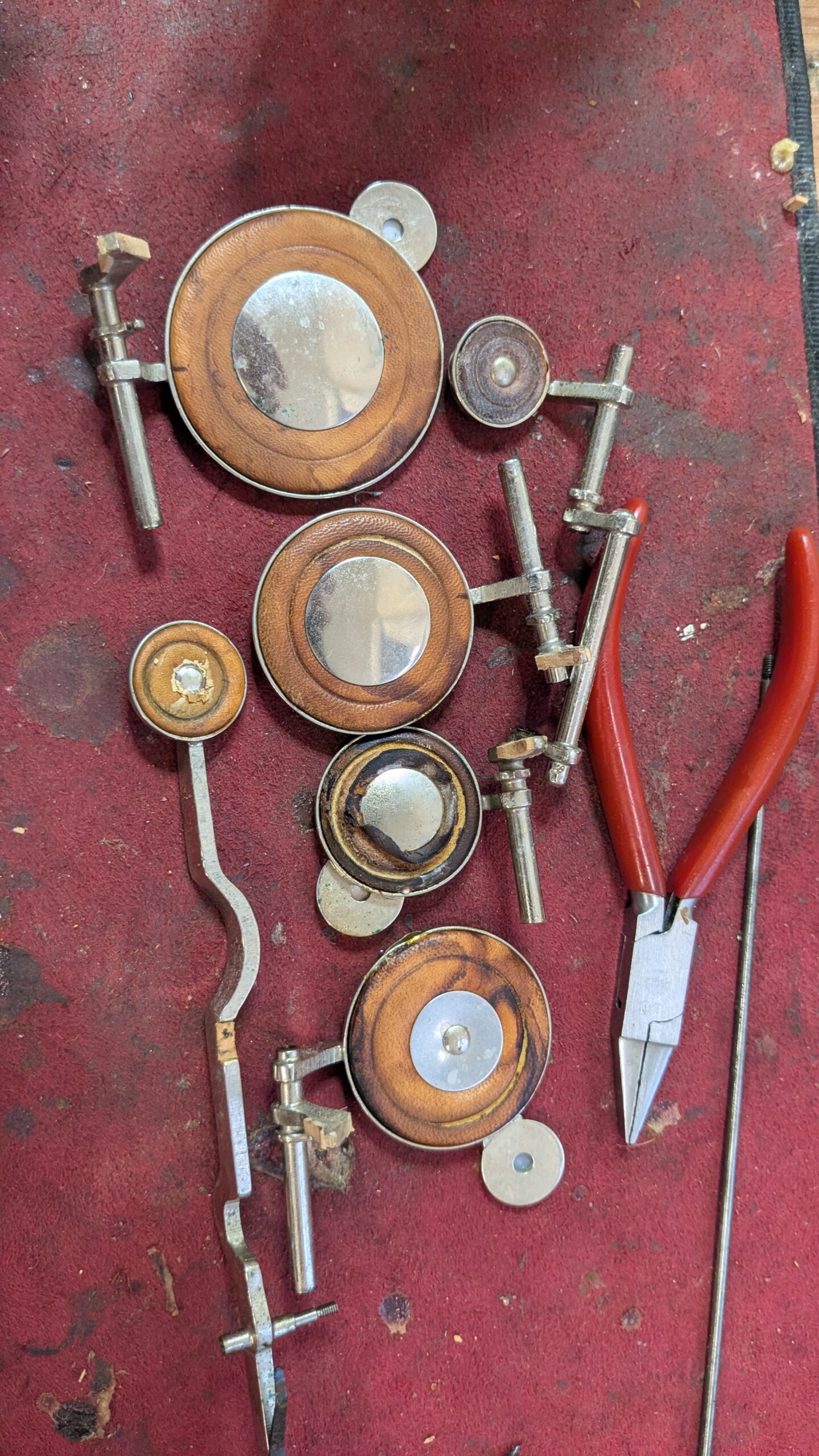 Worn and torn saxophone pads