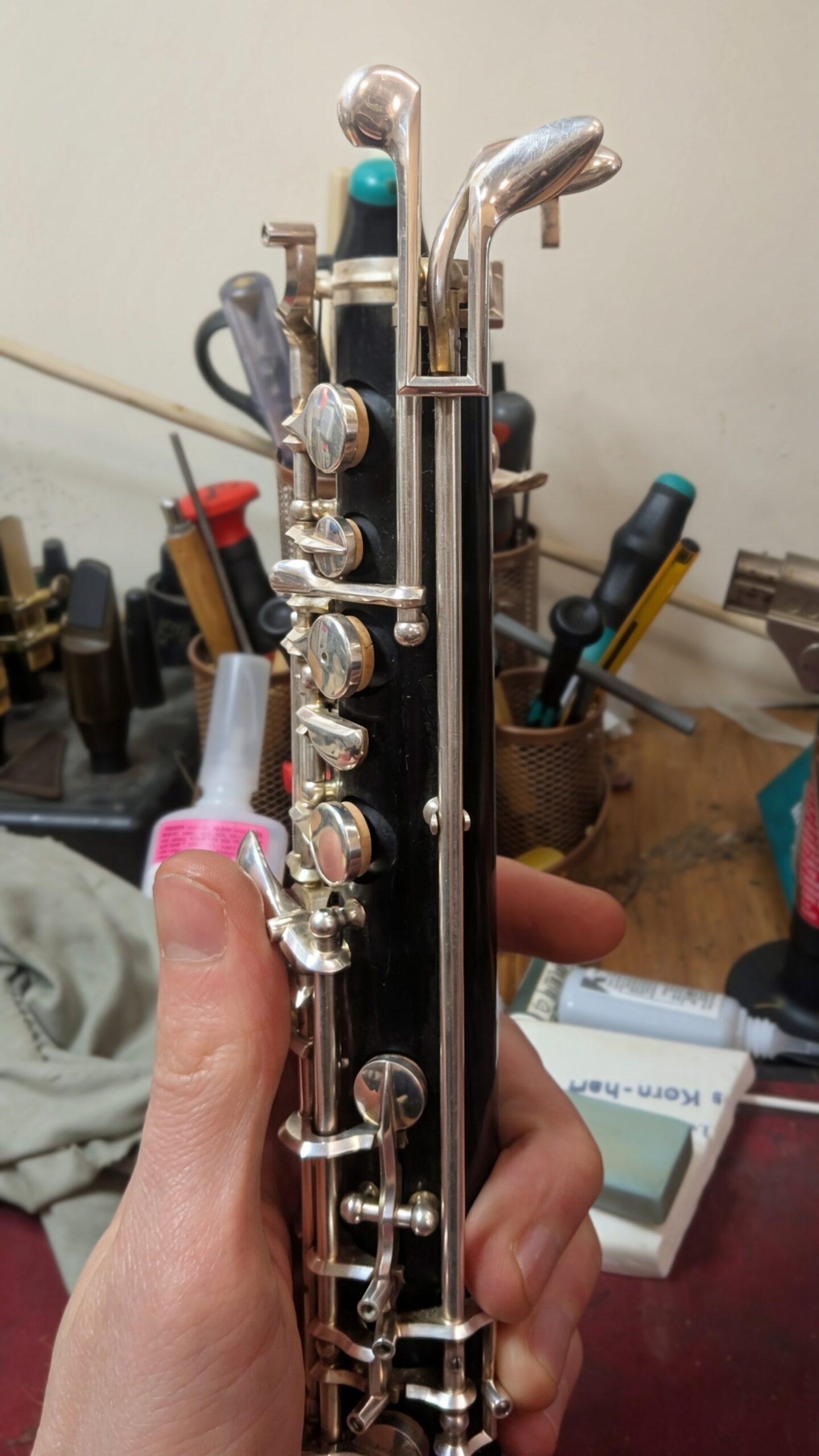 Bent feather keys on an oboe